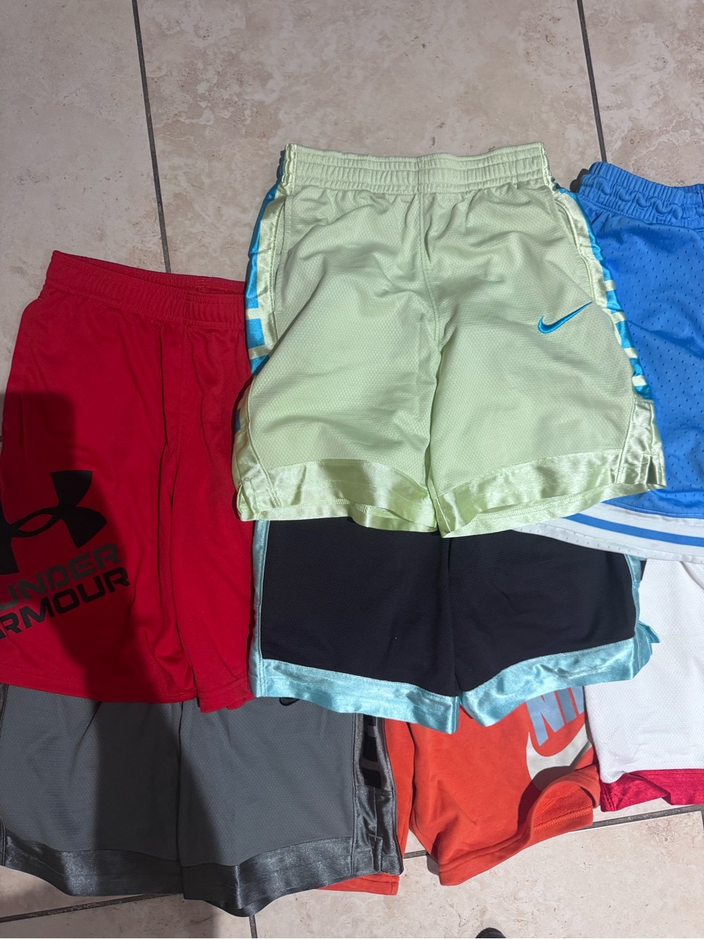 7 sets of boys Nike Kids Large, assorted colors Athletic Shorts all included